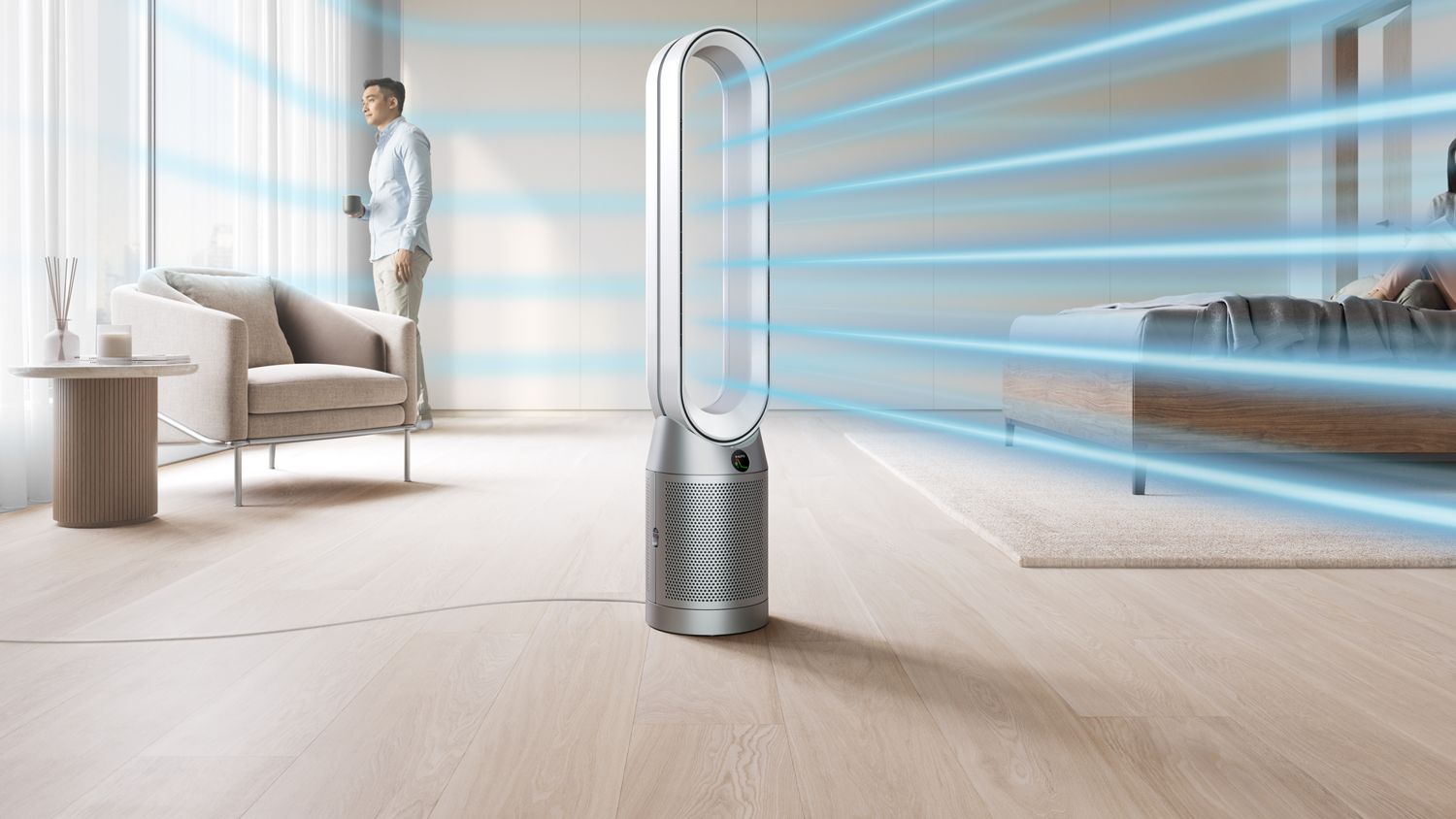 The Dyson Purifier Cool PC1 air purifier delivering a cool breeze with purified air in a large room.