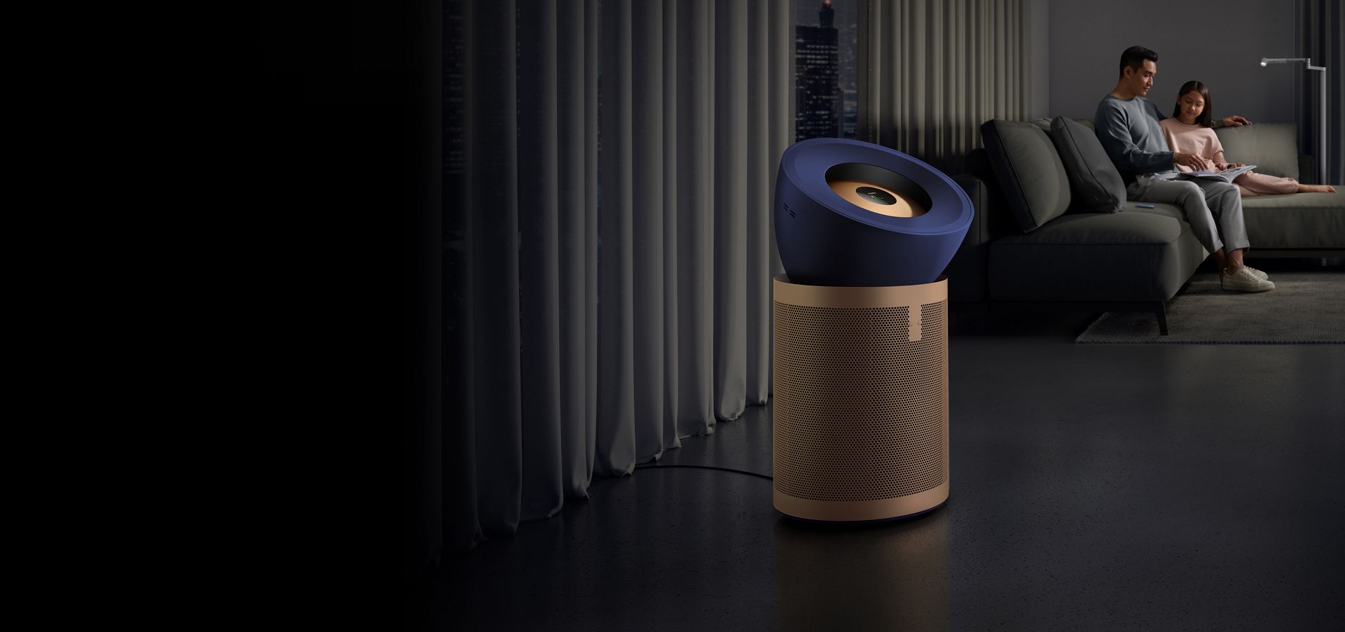 Dyson Purifier Big+Quiet Formaldehyde in a living room next to a sofa where a father and daughter are reading.