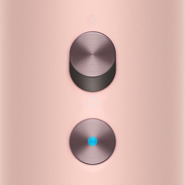 The power and Cold-shot buttons on the Dyson Supersonic Nural hair dryer.