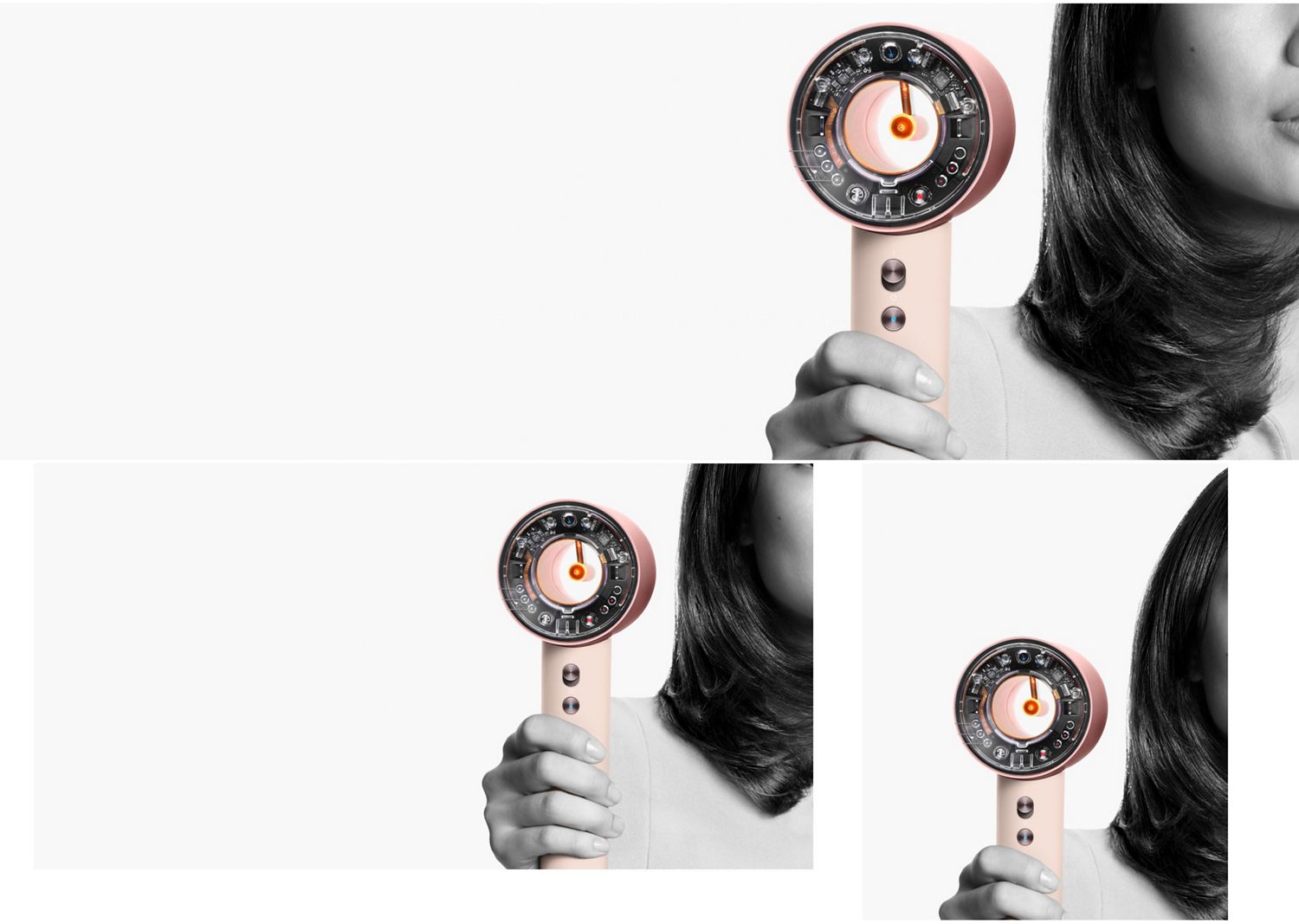 The Dyson Supersonic nural held by a model.