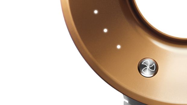 A close-up of the speed settings on the head of the Dyson Supersonic hair dryer.