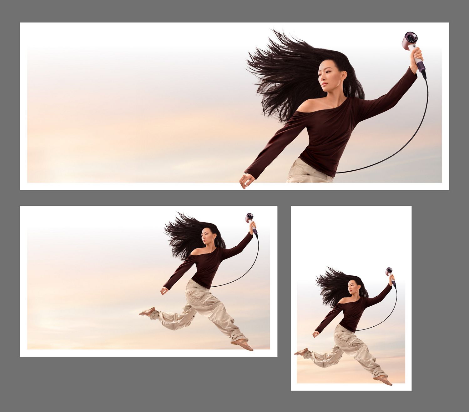 Modèle en plein saut, tenant le sèche-cheveux Dyson SupersonicMC Travel.