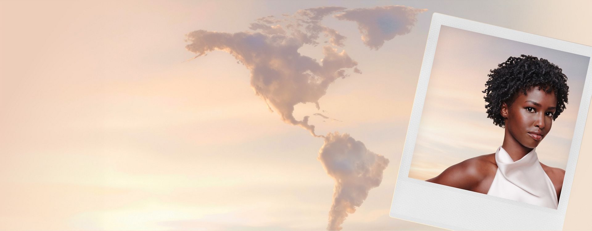 Awan-awan yang menyerupai peta benua Amerika, dengan foto polaroid seorang model dan aksesori diffuser.