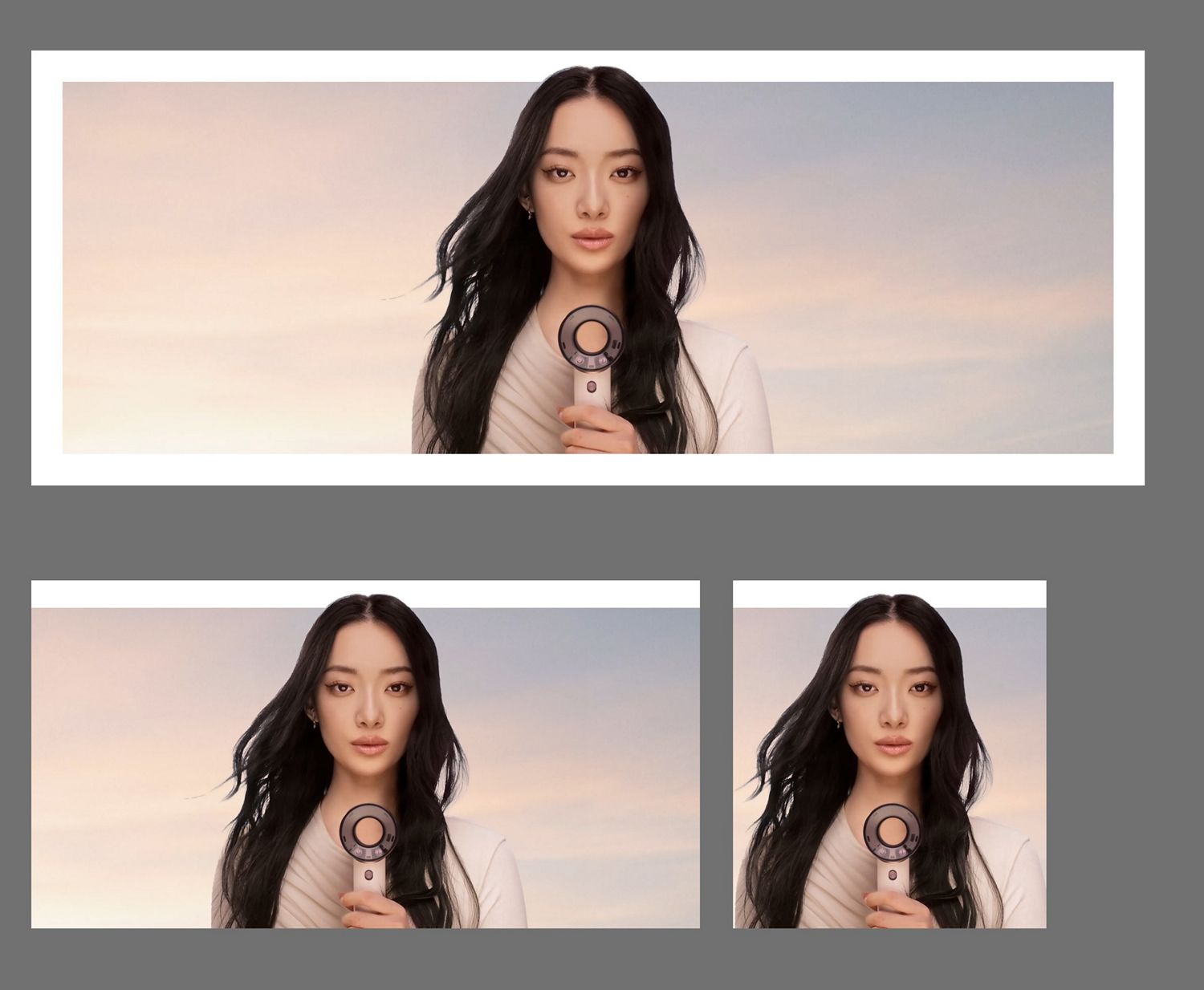 Model holds the Dyson Supersonic Travel hair dryer in front of herself.