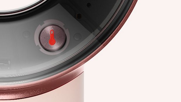 The temperature control button on the Dyson Supersonic Travel hair dryer.
