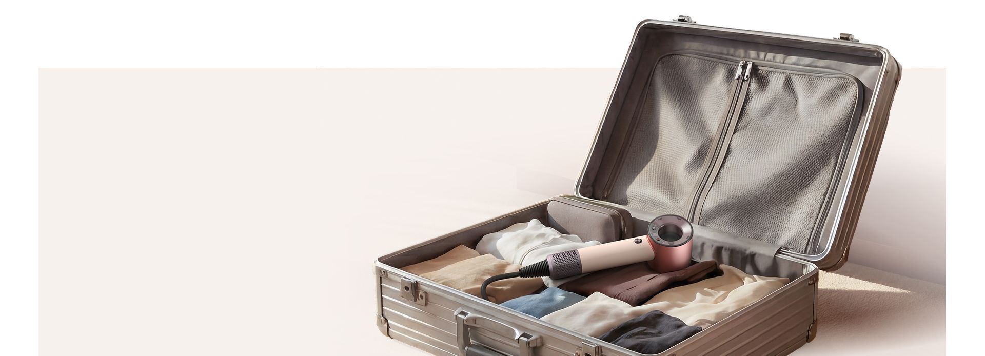 Dyson Supersonic Travel hair dryer in a suitcase.