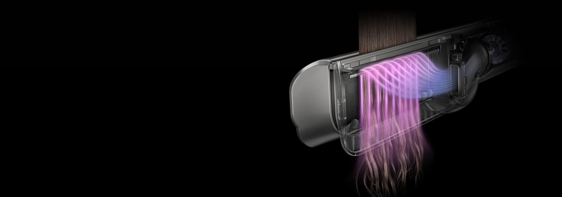 剖面圖顯示 Dyson Airstrait 二合一吹風直髮器手柄之間的氣流。