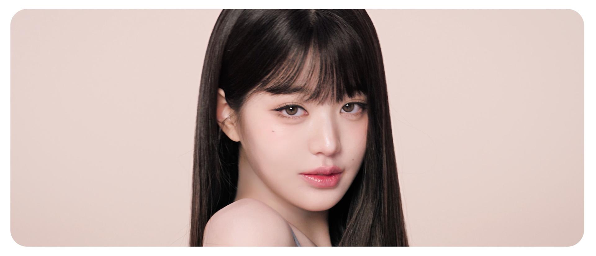 Model shows off sleek, smooth hair achieved with the Dyson Airstrait dryer and straightener.