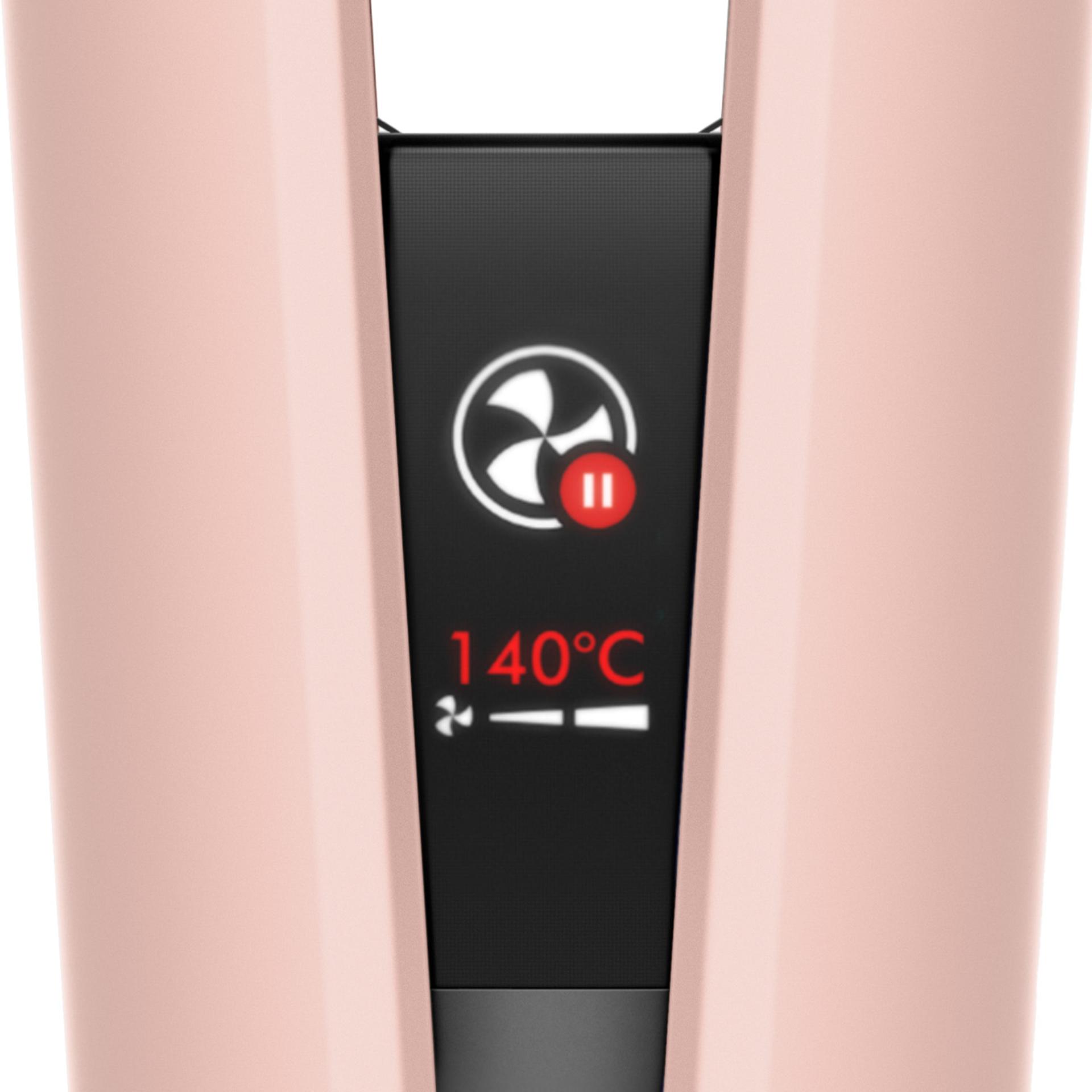 The LCD screen of the Dyson Airstrait straightener shows Auto-pause mode is active.