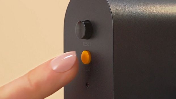 The test button is the smaller, lower button on the PRCD plug.