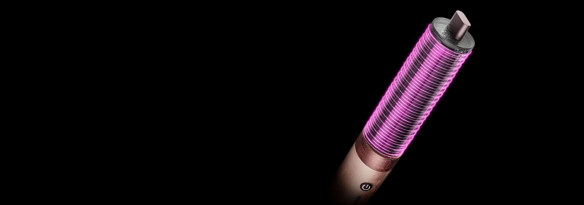 Pink graphics show the airflow around the Dyson Airwrap 40mm Co-anda2x curling barrel.