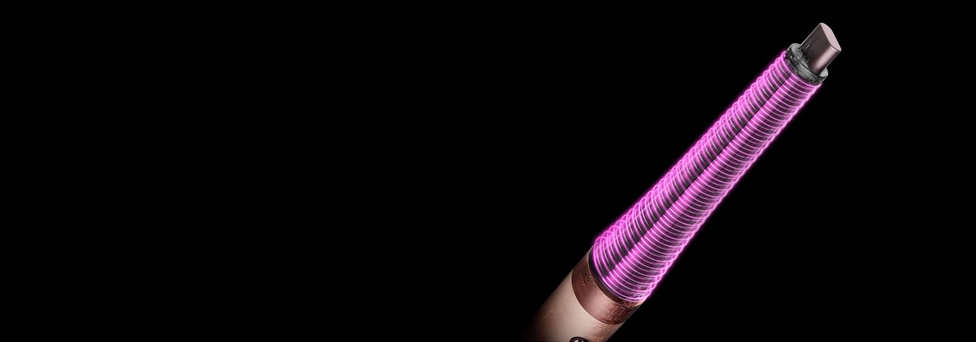 Pink graphics show the airflow around the Dyson Airwrap Conical Co-anda2x curling barrel.