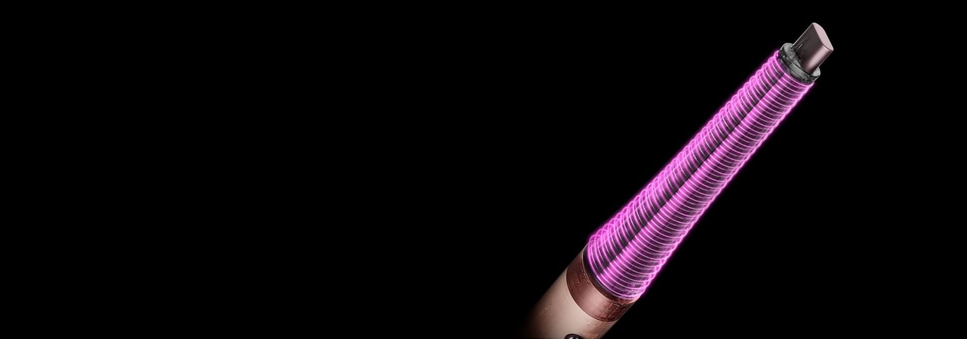 Pink graphics show the airflow around the Dyson Airwrap Conical Co-anda2x curling barrel.