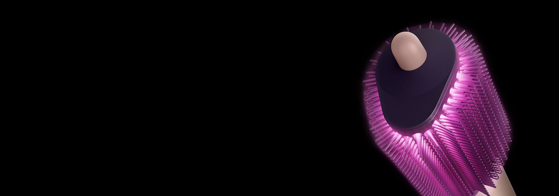 Pink graphics show airflow through the bristles on the Dyson Airsmooth styling brush.