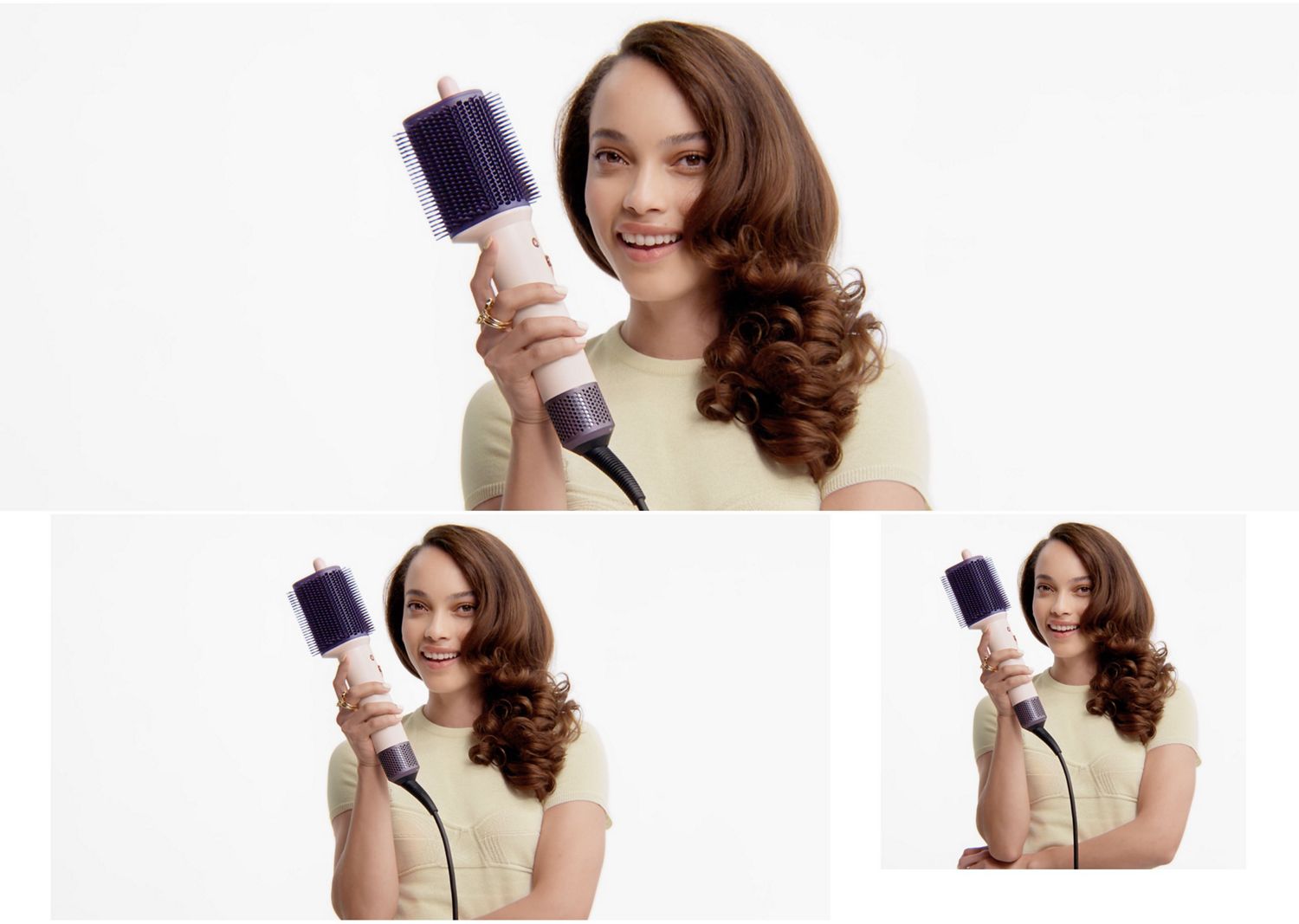 Model holds the Dyson Airsmooth styling brush.