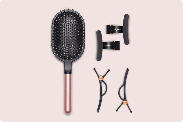 A range of Dyson hair care accessories.