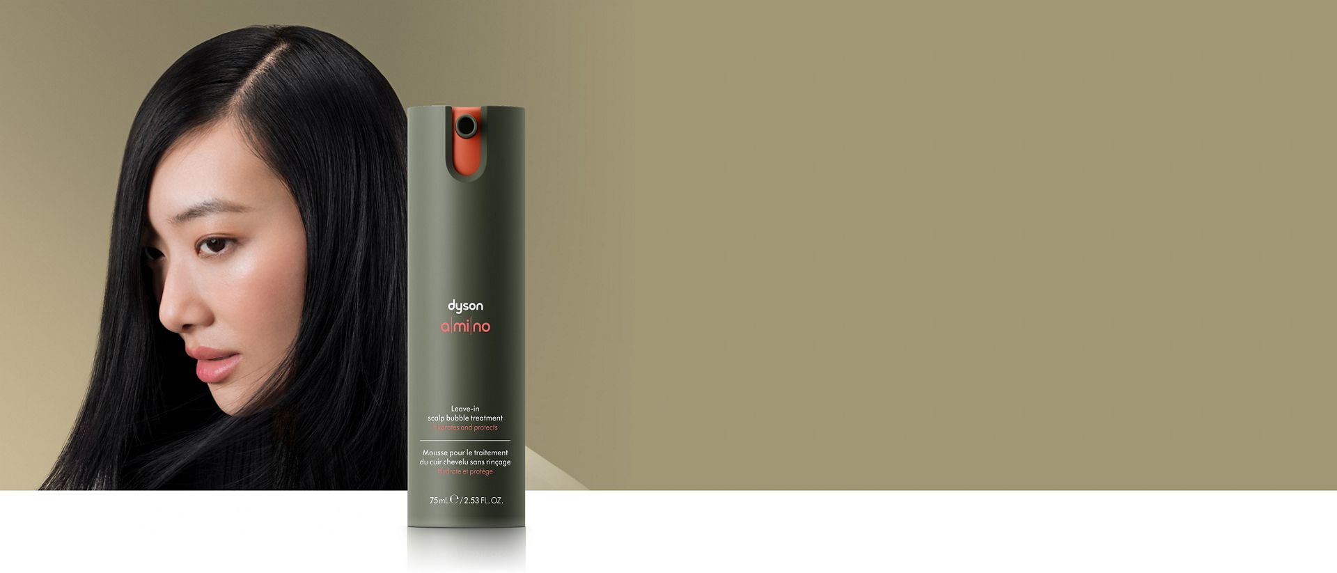 Dyson Amino leave-in scalp bubble treatment in front of a model.