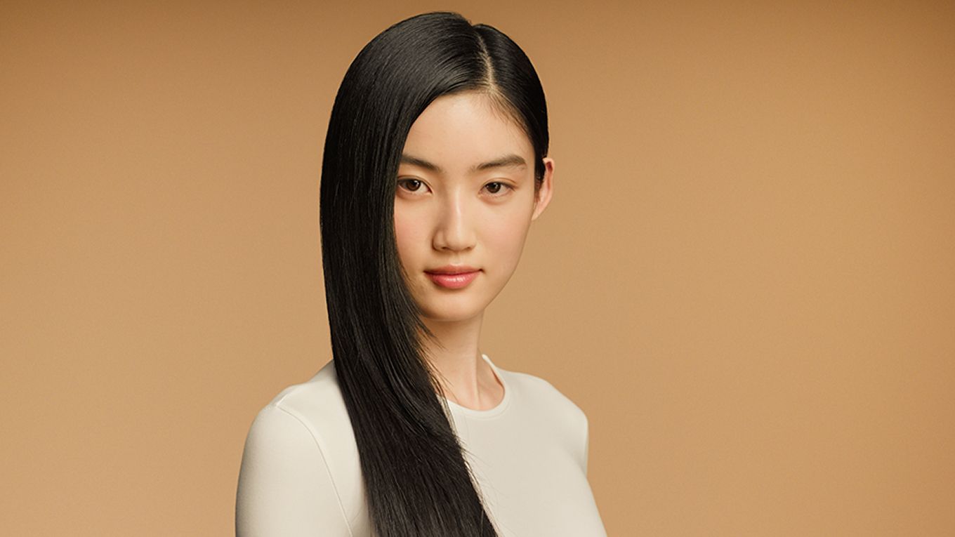 A model with sleek, straight, dark hair nourished with the Dyson Omega range. A model with sleek, straight, dark hair nourished with the Dyson Omega range.