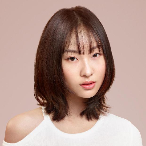 Model with short blow out hair