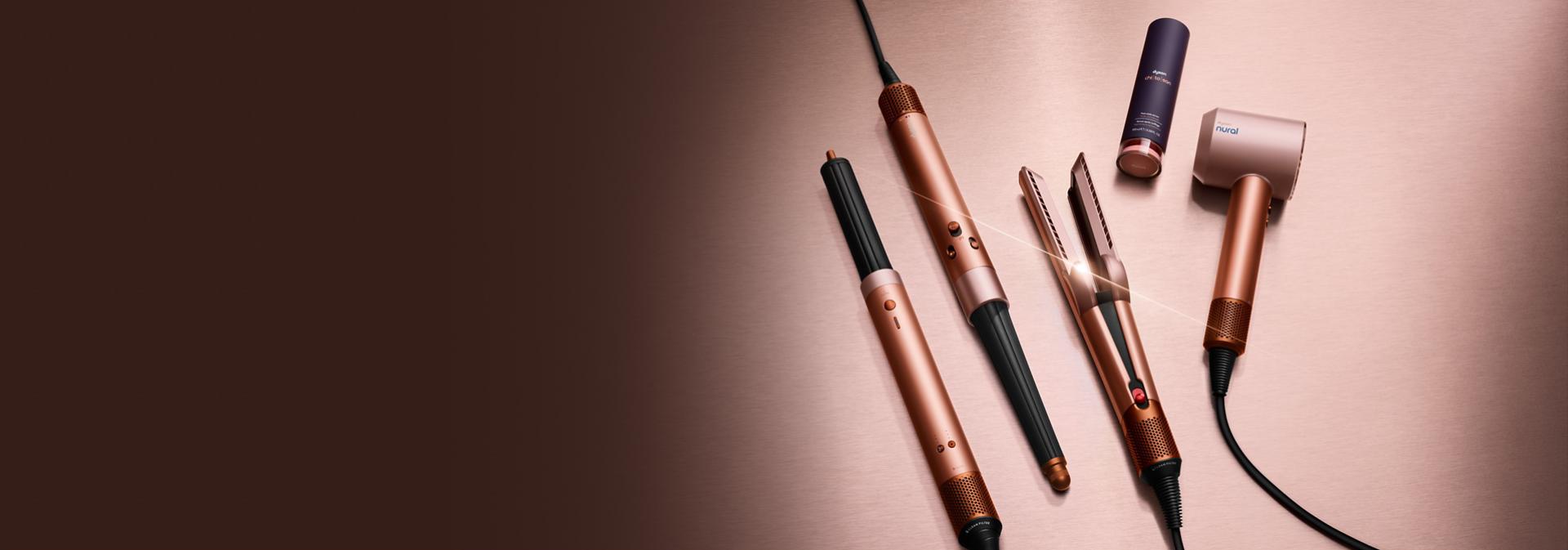 The Dyson Beauty device range in Amber silk colourway with Dyson Chitosan Pre-style cream.