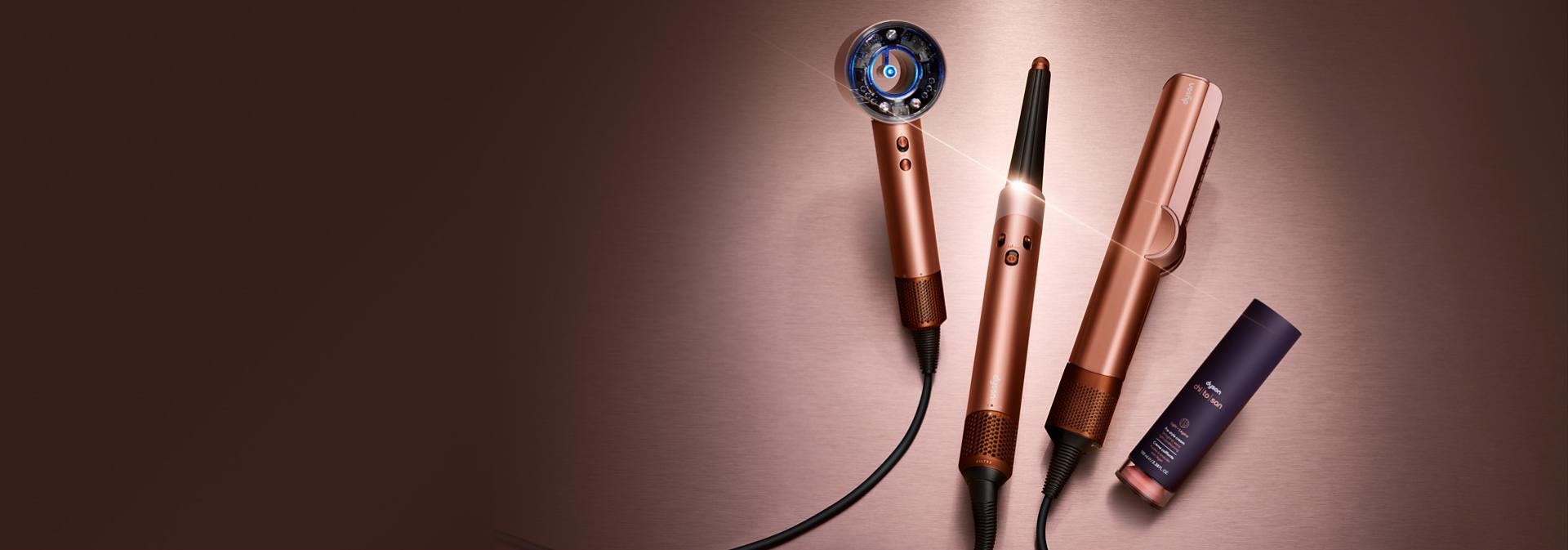 The Dyson Beauty device range in Amber silk colourway with Dyson Chitosan Pre-style cream.