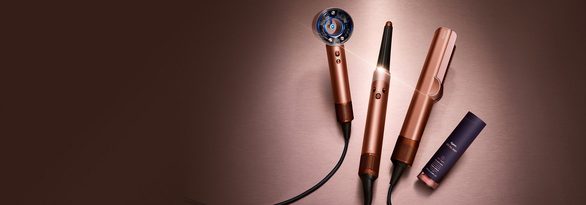 The Dyson Beauty device range in Amber silk colourway with Dyson Chitosan Pre-style cream.