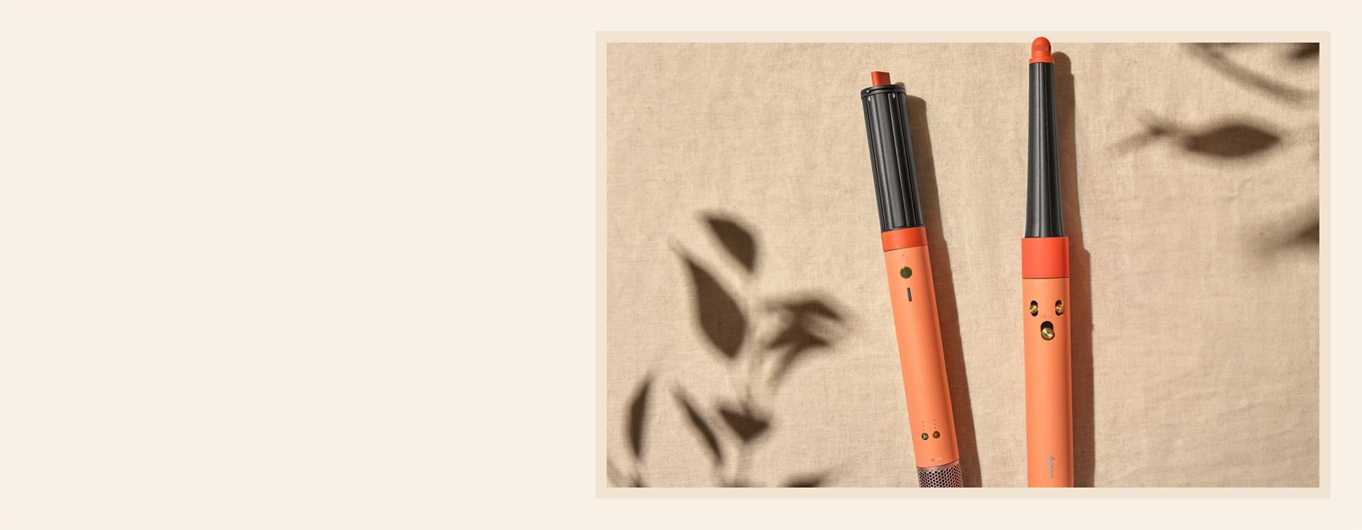 Dyson hajformázó eszközök beton háttér előtt