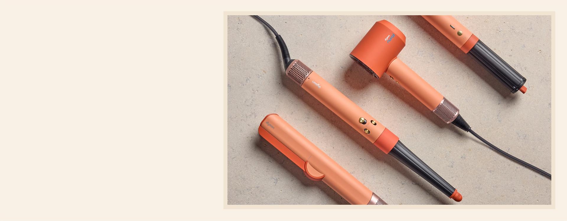 Dyson hajformázó eszközök beton háttér előtt