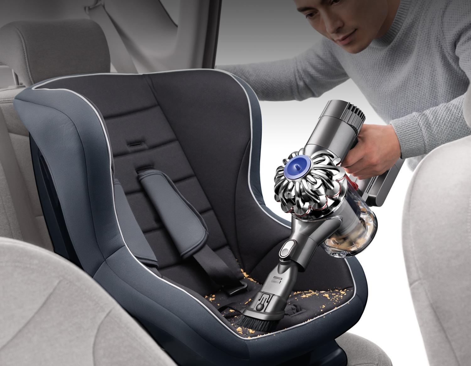 Dyson vacuum on child seat
