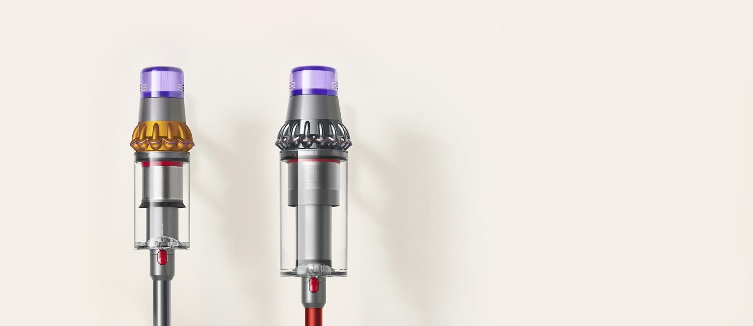 Dyson Outsize vacuum with 150% bigger bin next to a Dyson V15 vacuum bin.