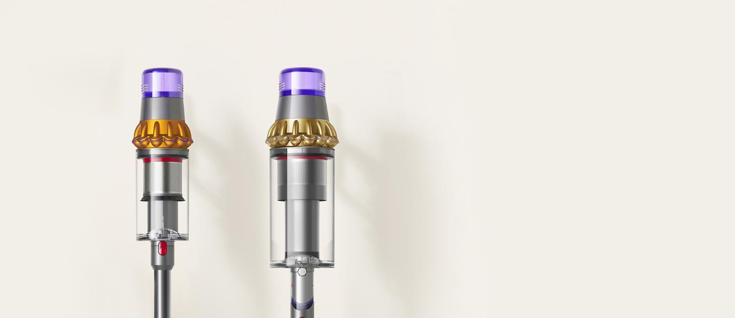 Dyson Outsize vacuum with 150% bigger bin next to a Dyson V15 vacuum bin.