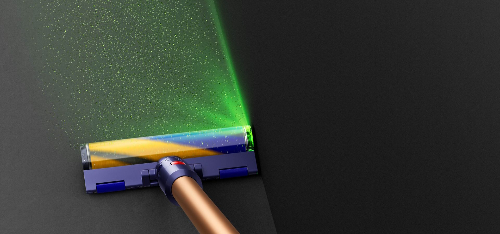 Vue de côté de la lame de lumière verte émise par la tête d’aspirateur Fluffy Optic.