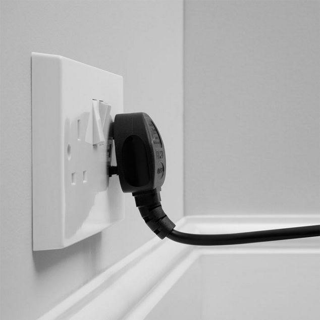 Plug being pulled from socket