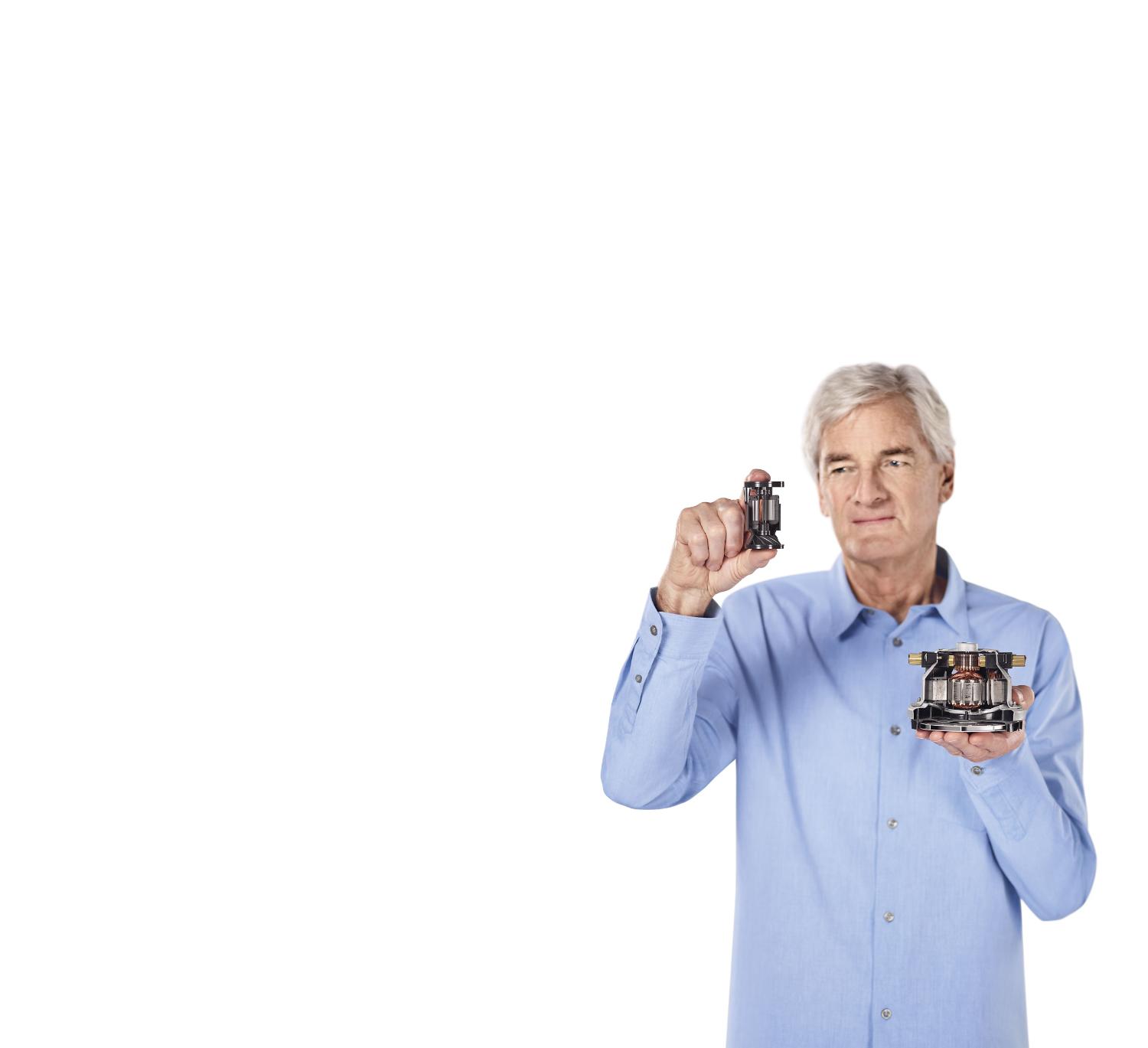 James Dyson holding Dyson digital motor V10