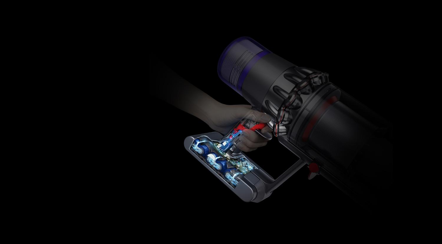 Udskåret diagram af Dyson V11™-støvsugerens udløser og batteri