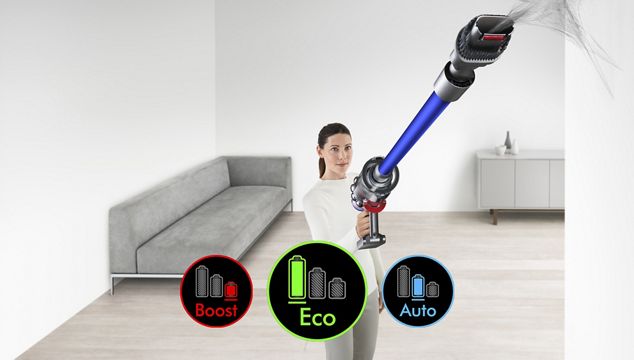 Woman cleaning ceiling with Dyson V11™ vacuum