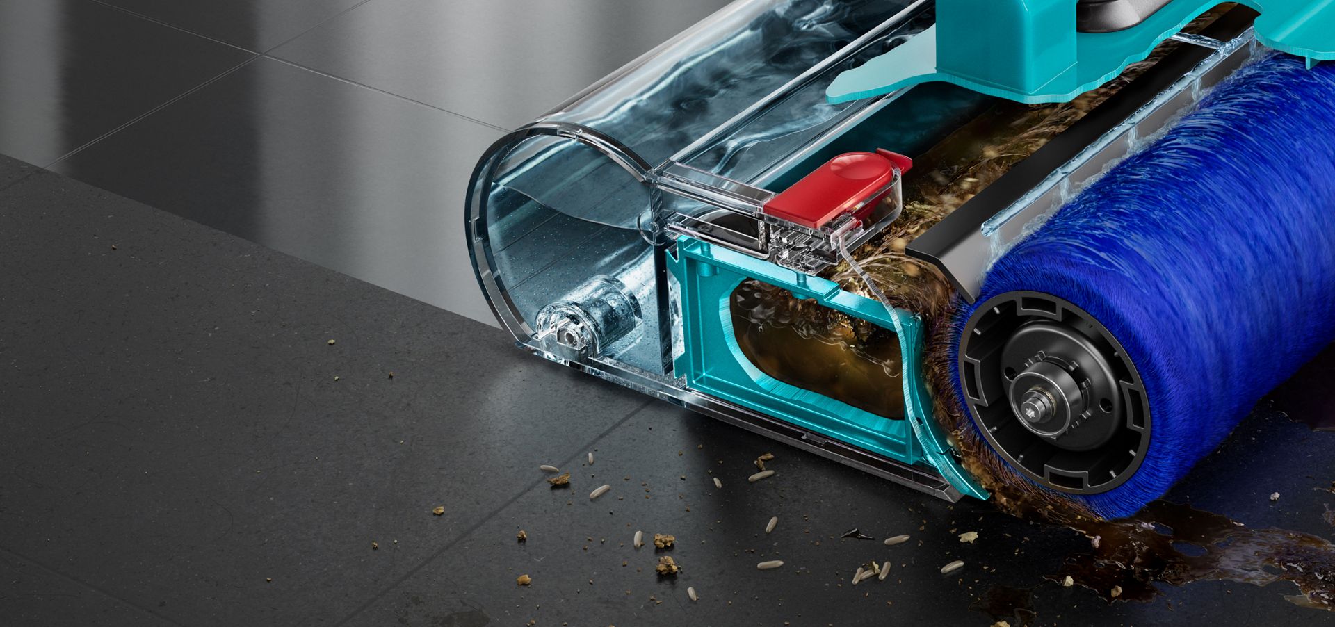 Nærbilde av tverrsnitt som viser Motorised Wet Roller-munnstykket på et steingulv, som etterlater ren glans, med avfall foran og på siden.