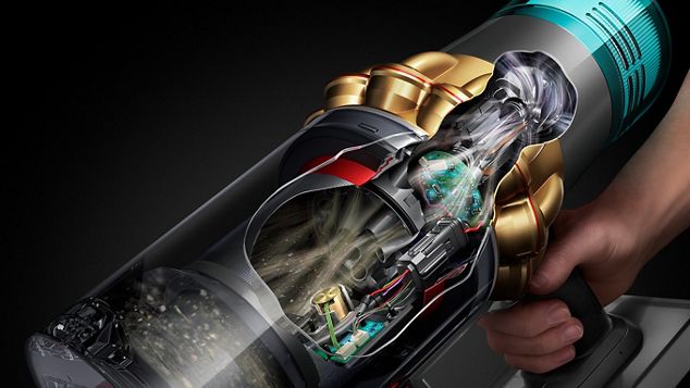 Vue en coupe du côté d’un Dyson V15s Detect Submarine montrant les débris filtrés dans l’appareil.