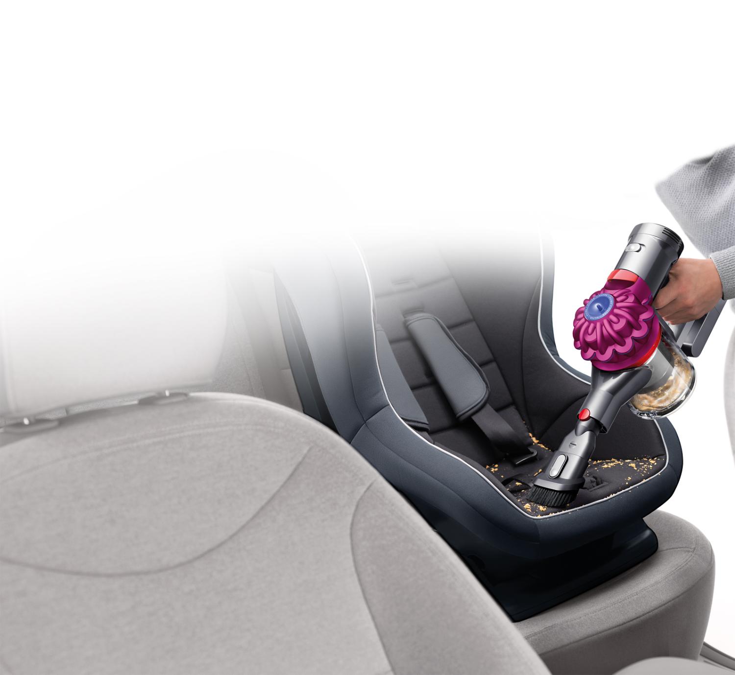 Dyson cord-free vacuum on car seat