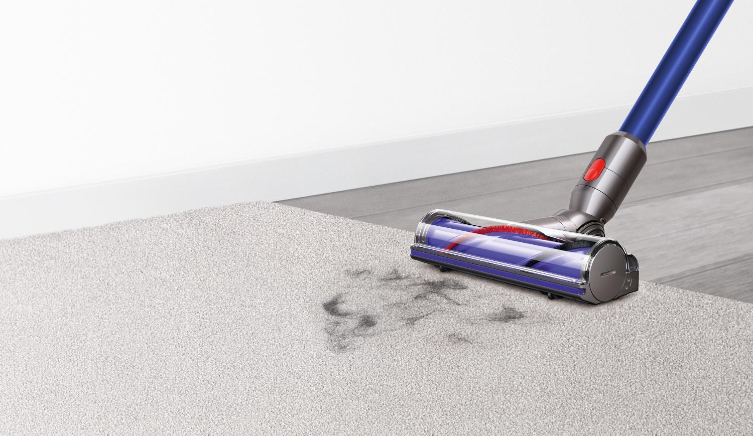 Dyson v7 cordless vacuum cleaner head on carpet