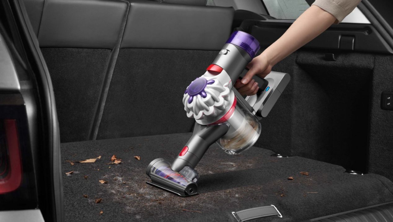 Hair screw tool cleaning a car interior