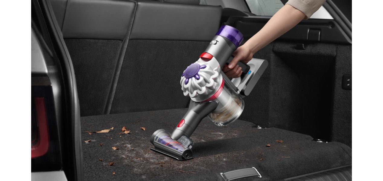 Hair screw tool cleaning a car interior