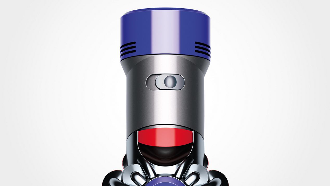 Close-up of Dyson V8 vacuum's power mode button