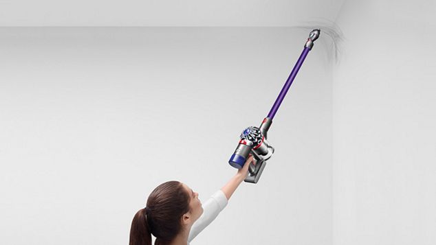 Model cleaning up high with Dyson V8 Animal vacuum