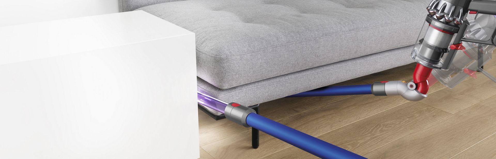 Dyson vacuum accessories cleaning a sofa