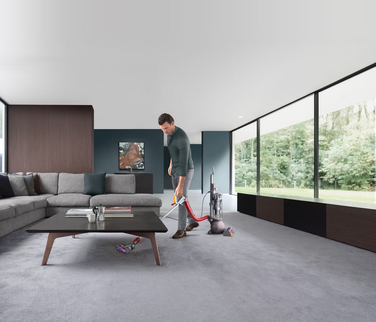 Cleaning under table with carbon fibre cleaner head