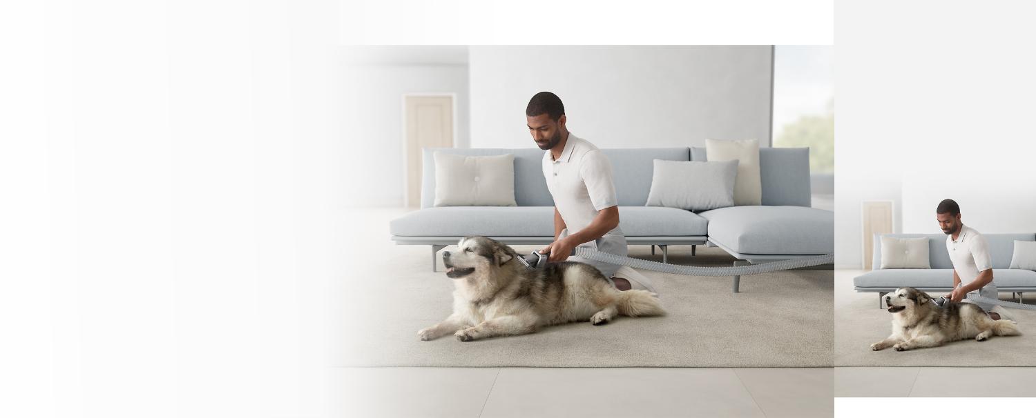 Man using the Pet groom tool on his dog
