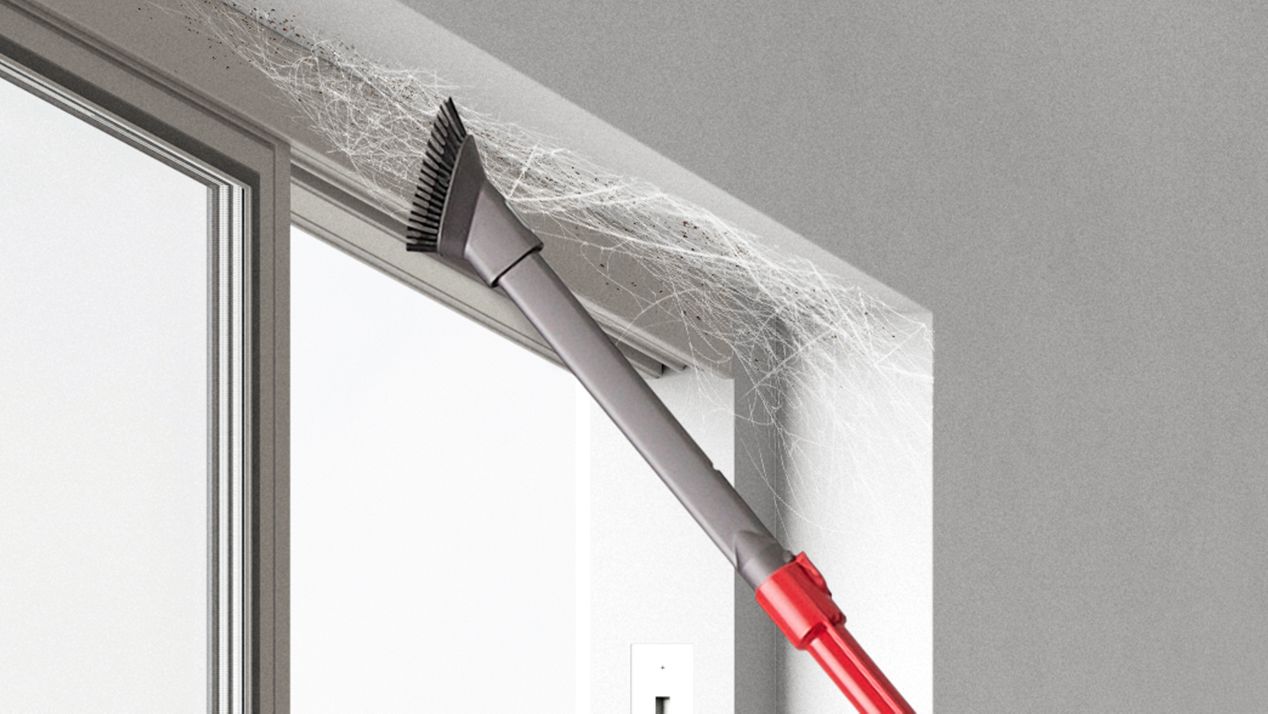 Combination tool Combination tool being used to clean cobwebs at the top of a window