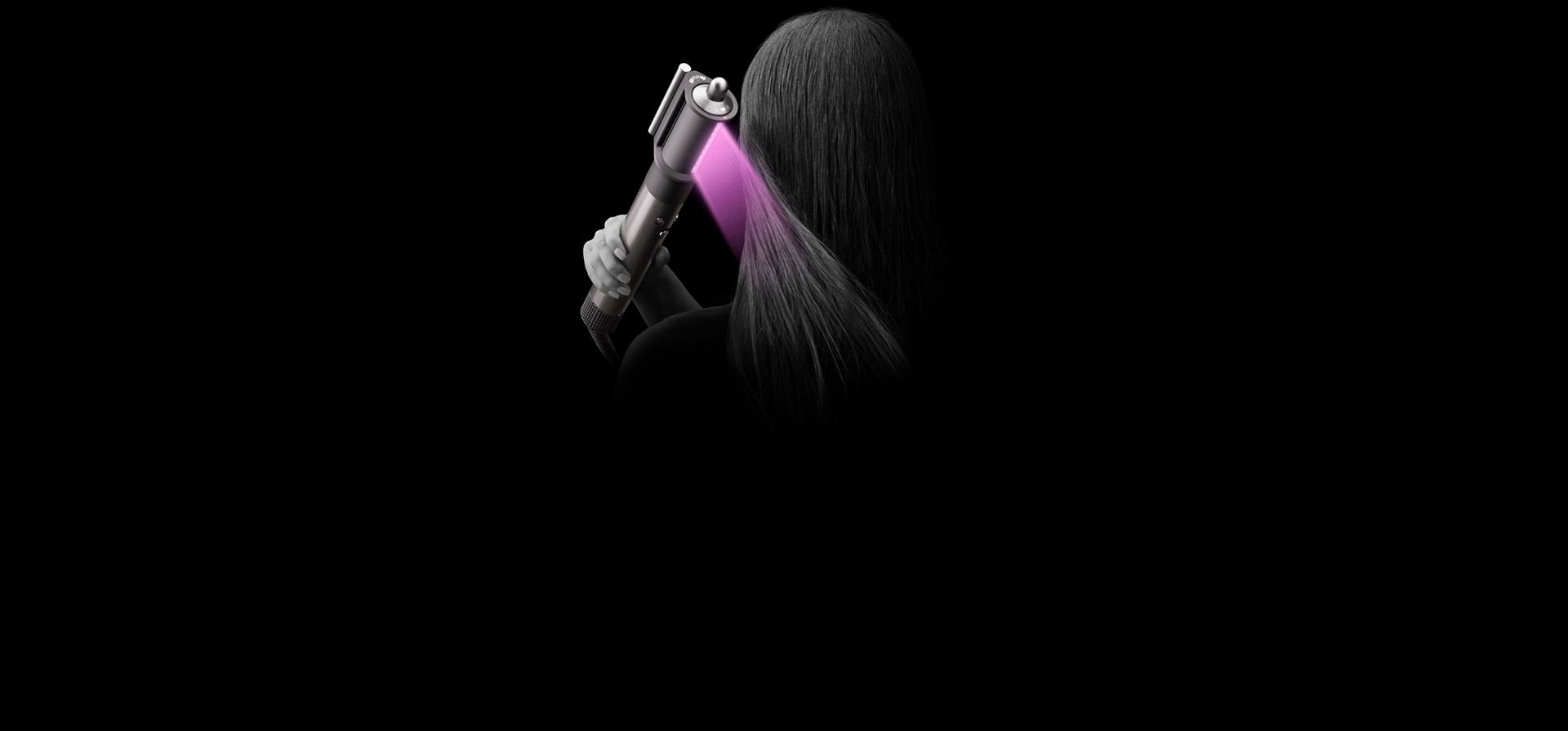 The Airwrap multi-styler and dryer being used to dry hair