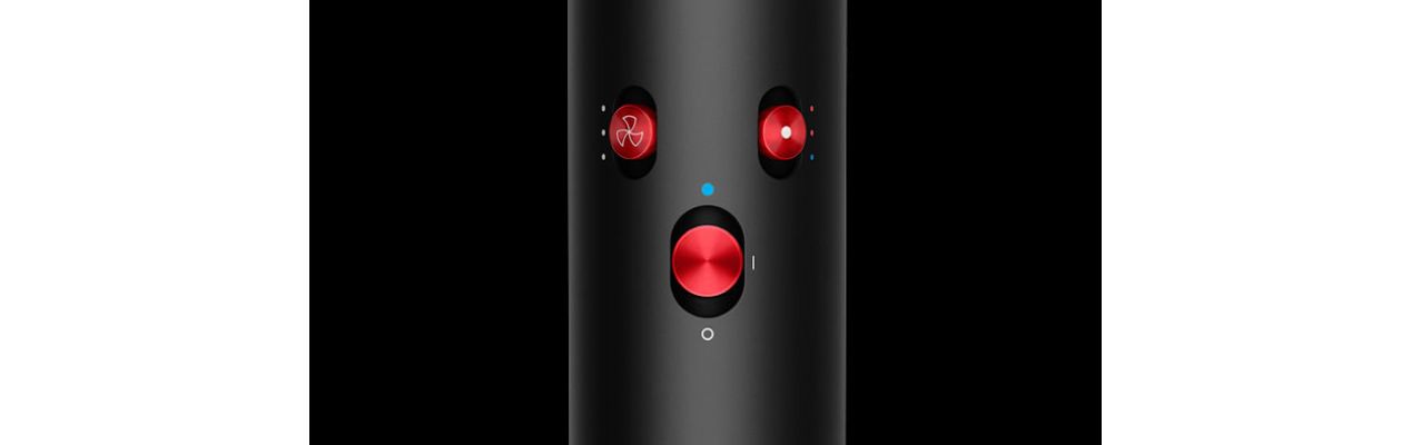 En närbild av inställningsknapparna på handtaget på Dyson Airwrap multi-styler och hårfön.